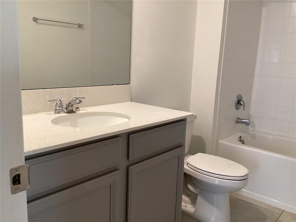 260 Pershing Street Bartow, FL 33830 - Photo 67 of 89 a bathroom with a sink toilet vanity and bathtub