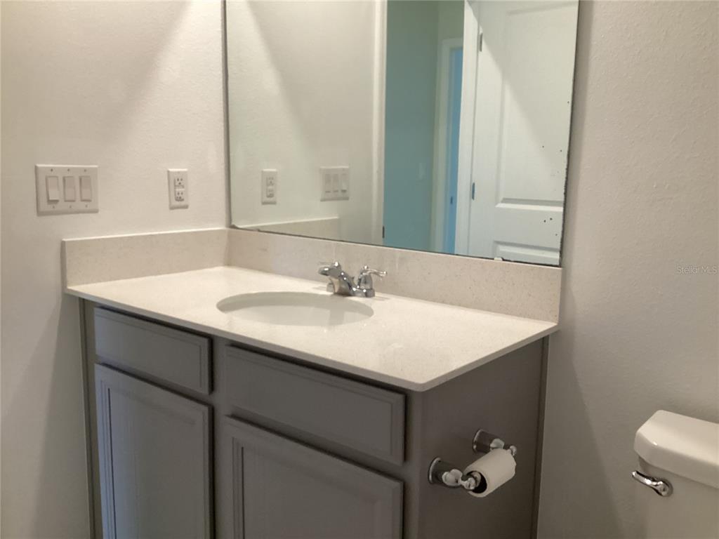 260 Pershing Street Bartow, FL 33830 - Photo 69 of 89 a bathroom with a sink vanity and a mirror