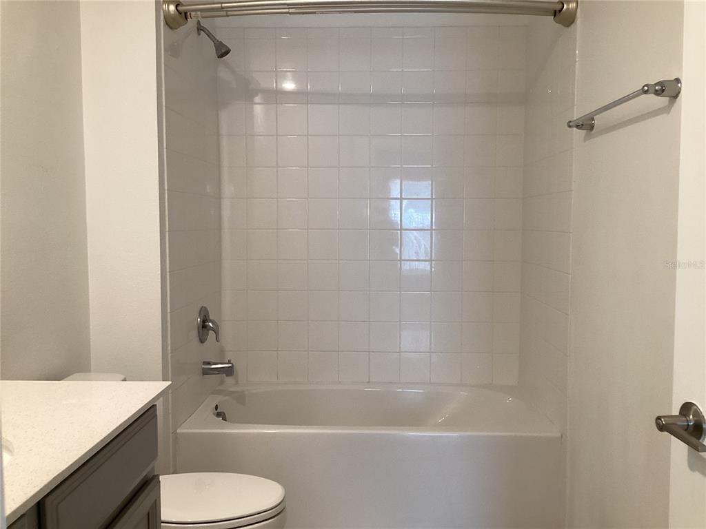 260 Pershing Street Bartow, FL 33830 - Photo 71 of 89 a bathroom with a shower a toilet and a bathtub