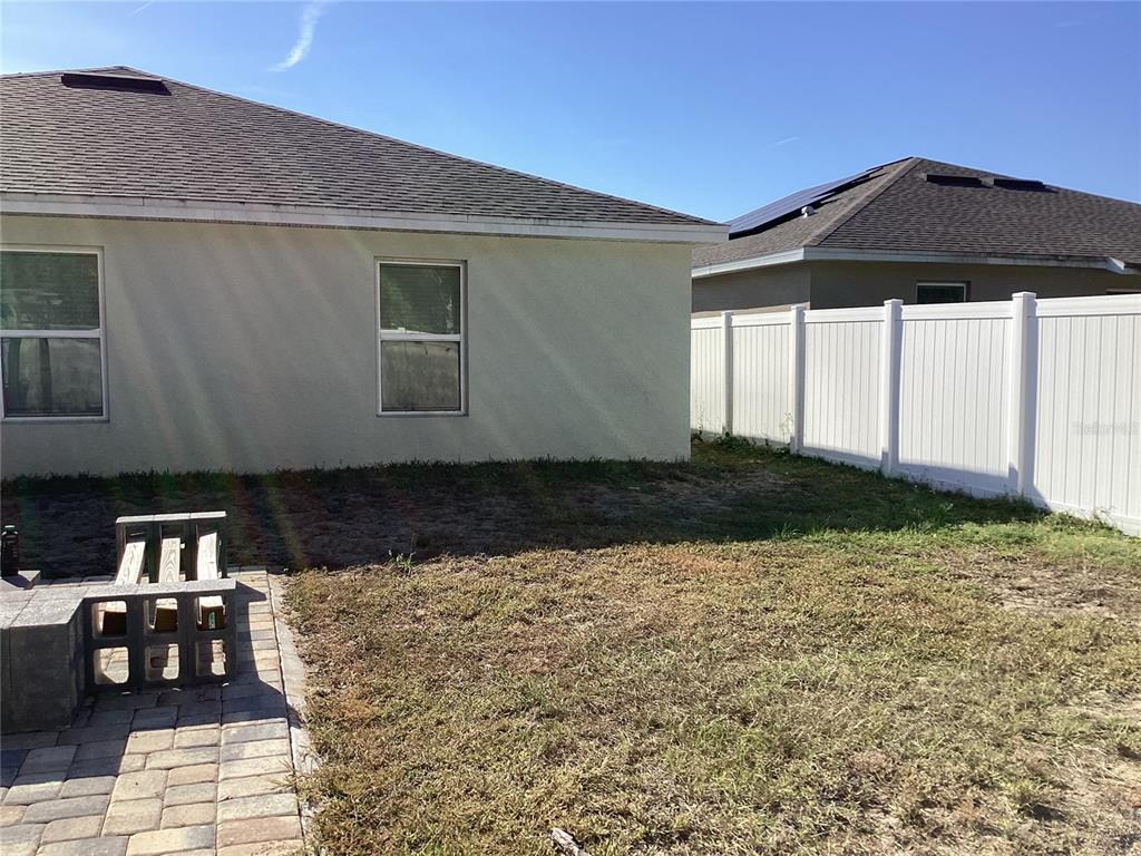 260 Pershing Street Bartow, FL 33830 - Photo 84 of 89 a front view of a house with a yard