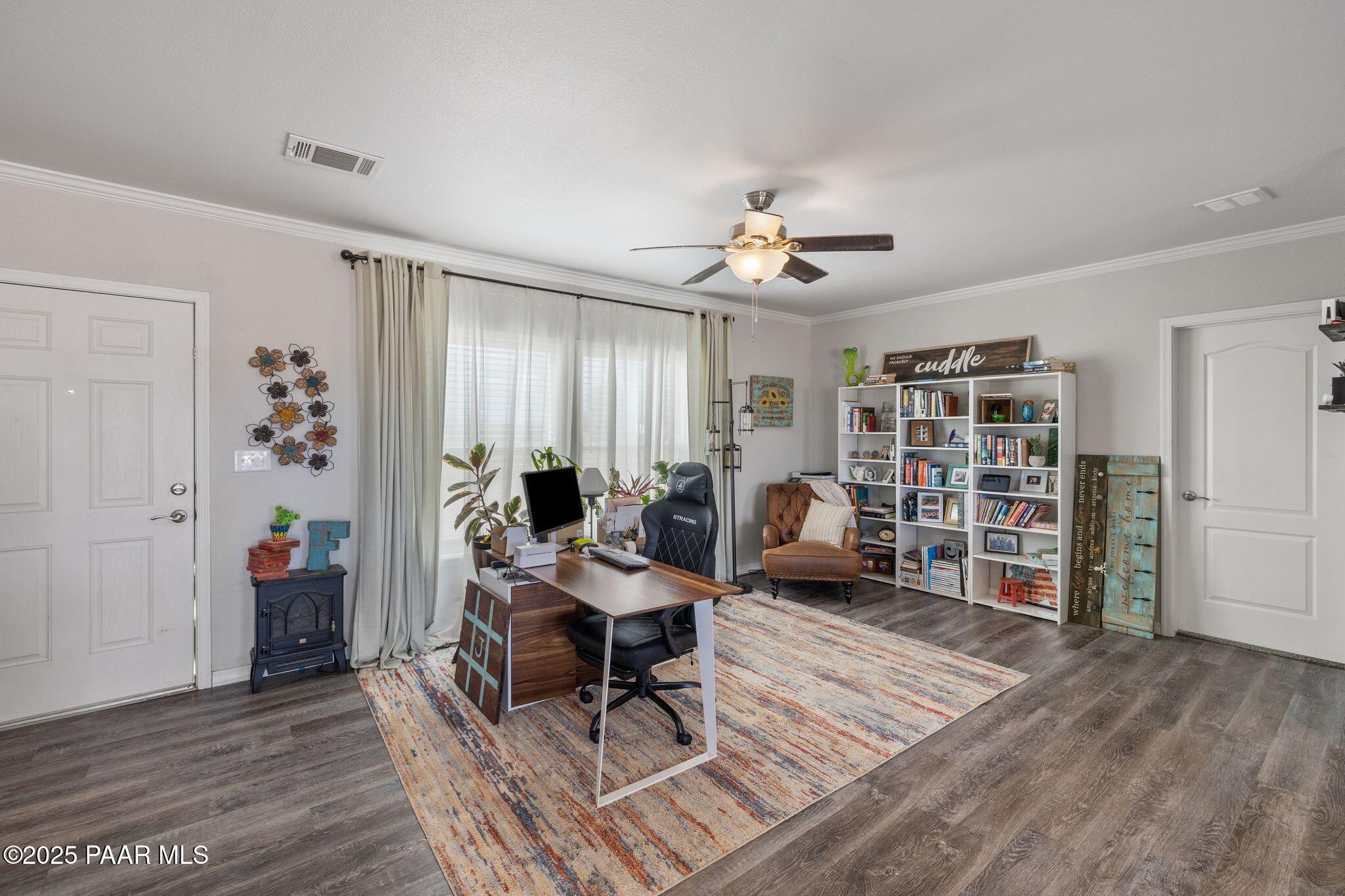 25221 North Mitchell Road Paulden, AZ 86334 - Photo 2 of 25 a living room with furniture and a wooden floor