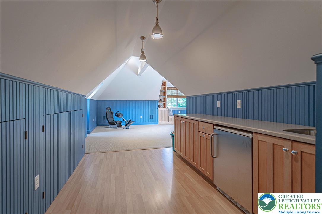 3054 Jordan Road Orefield, PA 18069 - Photo 31 of 58 Rec room with beverage fridge and sink.
