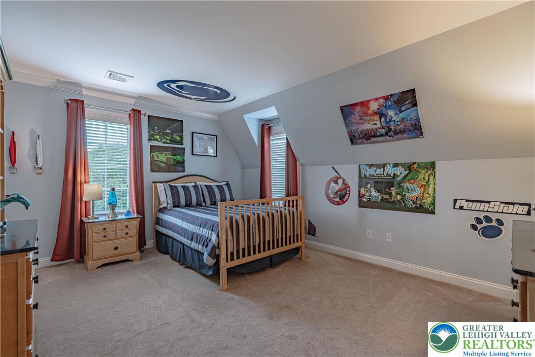 3054 Jordan Road Orefield, PA 18069 - Photo 35 of 58 a bedroom with a bed and a window