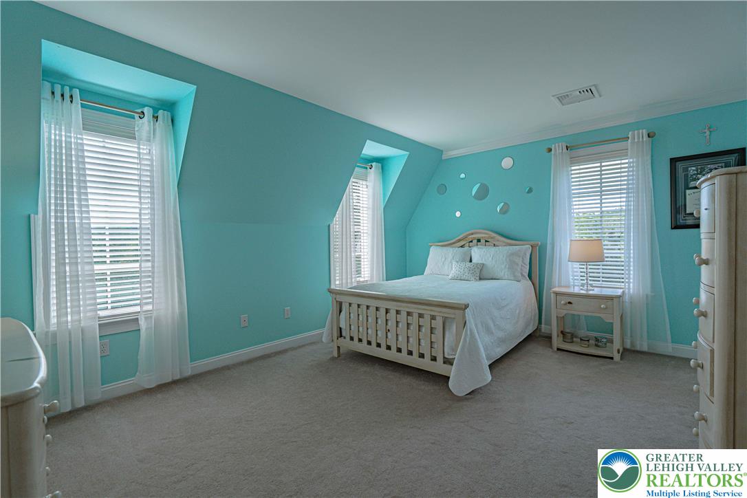 3054 Jordan Road Orefield, PA 18069 - Photo 37 of 58 a bedroom with a bed and a window