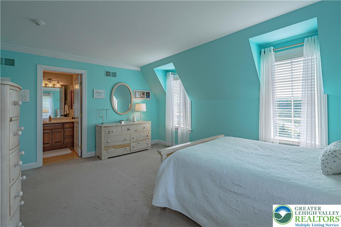 3054 Jordan Road Orefield, PA 18069 - Photo 38 of 58 a bedroom with a bed and a dresser