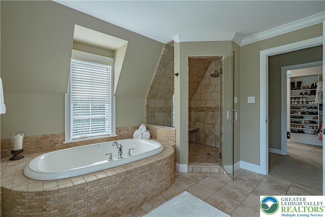 3054 Jordan Road Orefield, PA 18069 - Photo 39 of 58 a bathroom with bathtub and shower