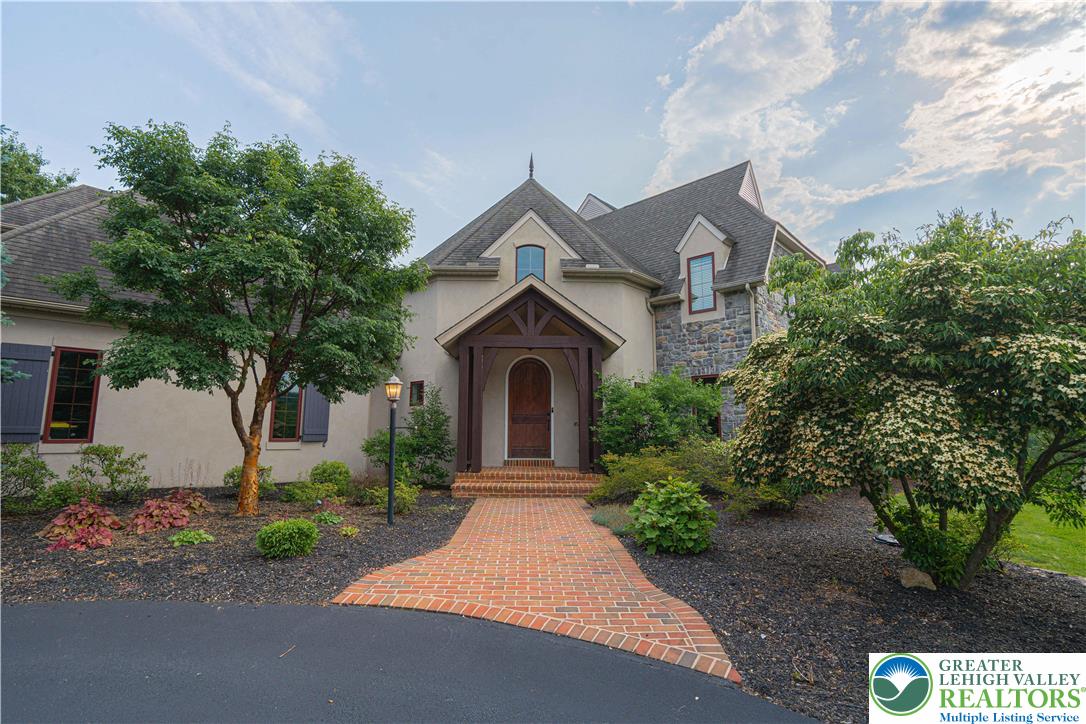 3054 Jordan Road Orefield, PA 18069 - Photo 4 of 58 a front view of a house with garden