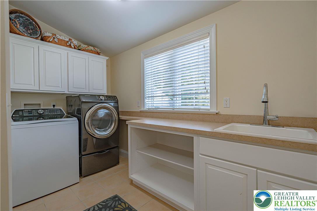 3054 Jordan Road Orefield, PA 18069 - Photo 41 of 58 a view of storage and utility room with washer and dryer