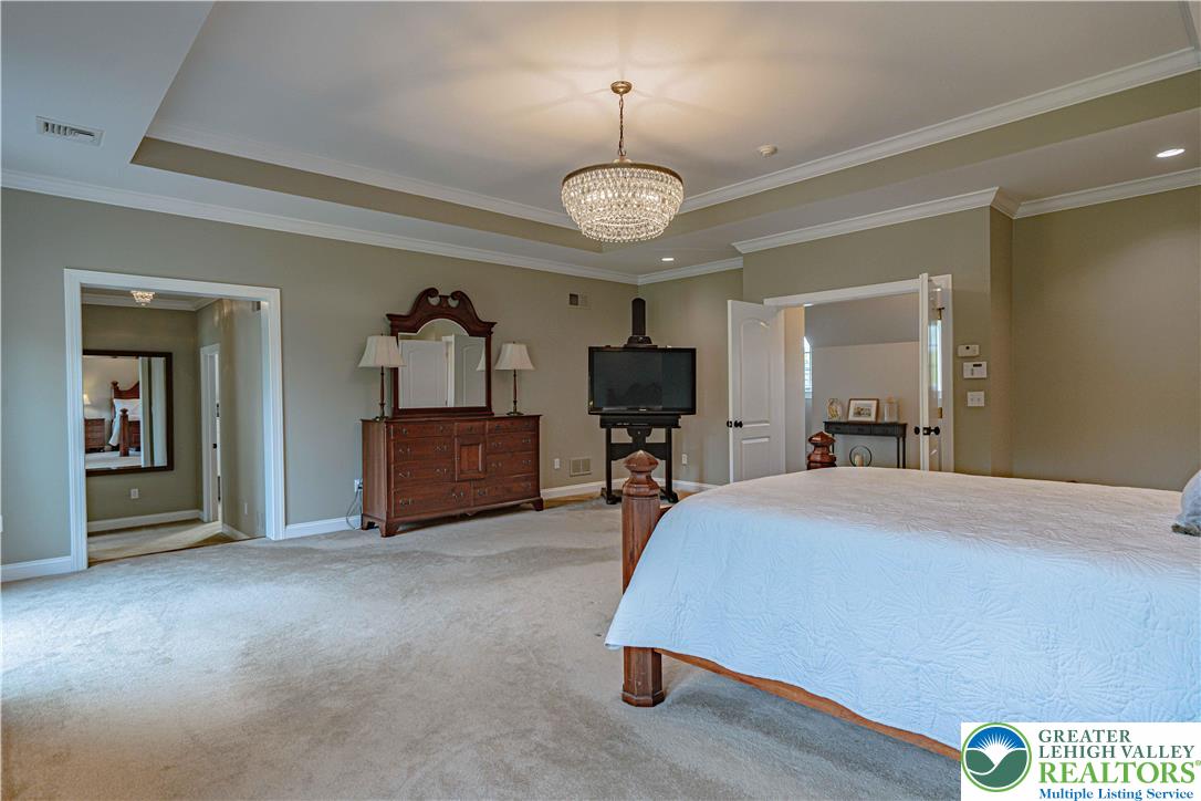 3054 Jordan Road Orefield, PA 18069 - Photo 44 of 58 a living room with furniture and a flat screen tv