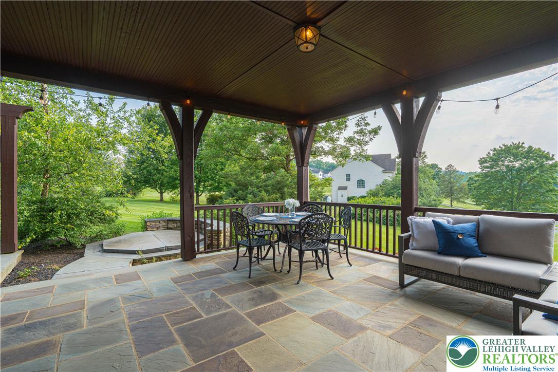 3054 Jordan Road Orefield, PA 18069 - Photo 49 of 58 a patio with yard table and chairs