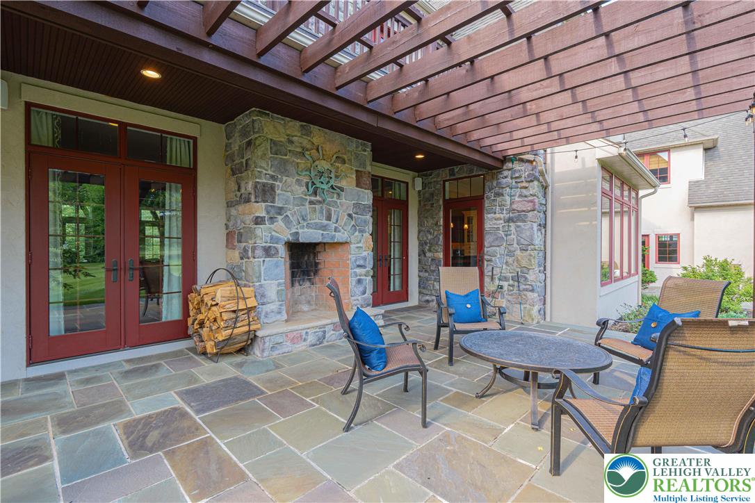 3054 Jordan Road Orefield, PA 18069 - Photo 55 of 58 a outdoor living space with furniture and a fireplace