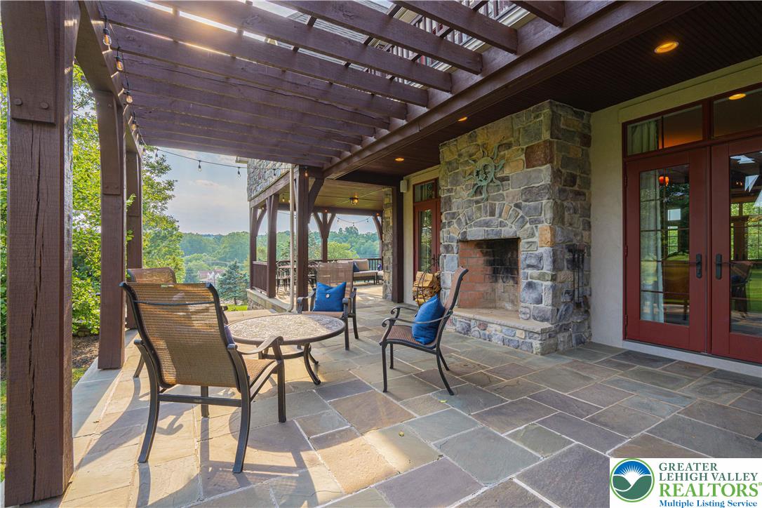 3054 Jordan Road Orefield, PA 18069 - Photo 56 of 58 a dining room with furniture and large windows