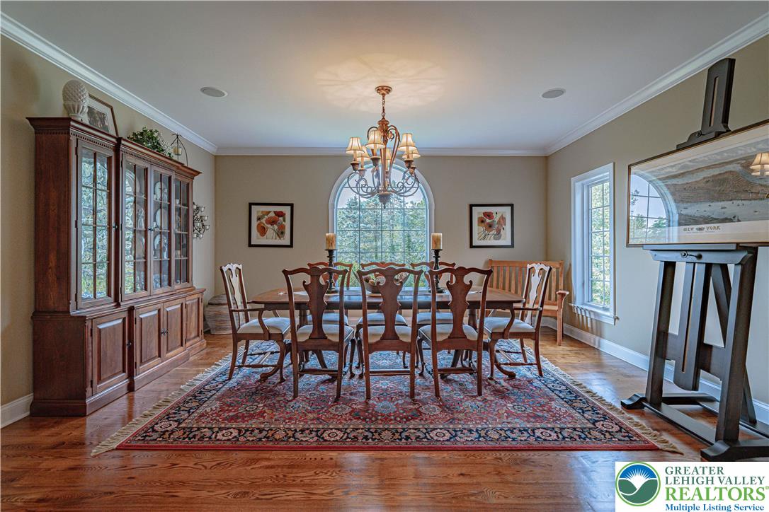 3054 Jordan Road Orefield, PA 18069 - Photo 6 of 58 a view of a dining room with furniture window and wooden floor