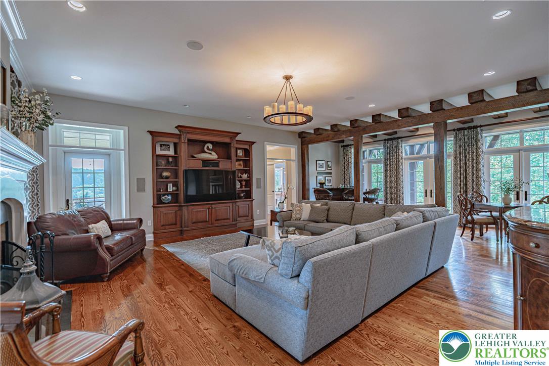 3054 Jordan Road Orefield, PA 18069 - Photo 8 of 58 a living room with furniture and wooden floor