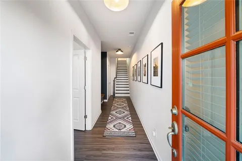 a view of balcony with wooden floor