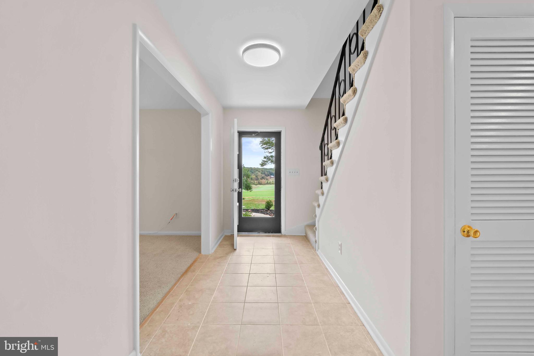 1016 Cold Bottom Road Sparks Glencoe, MD 21152 - Photo 5 of 39 Inviting entryway with serene outdoor views.