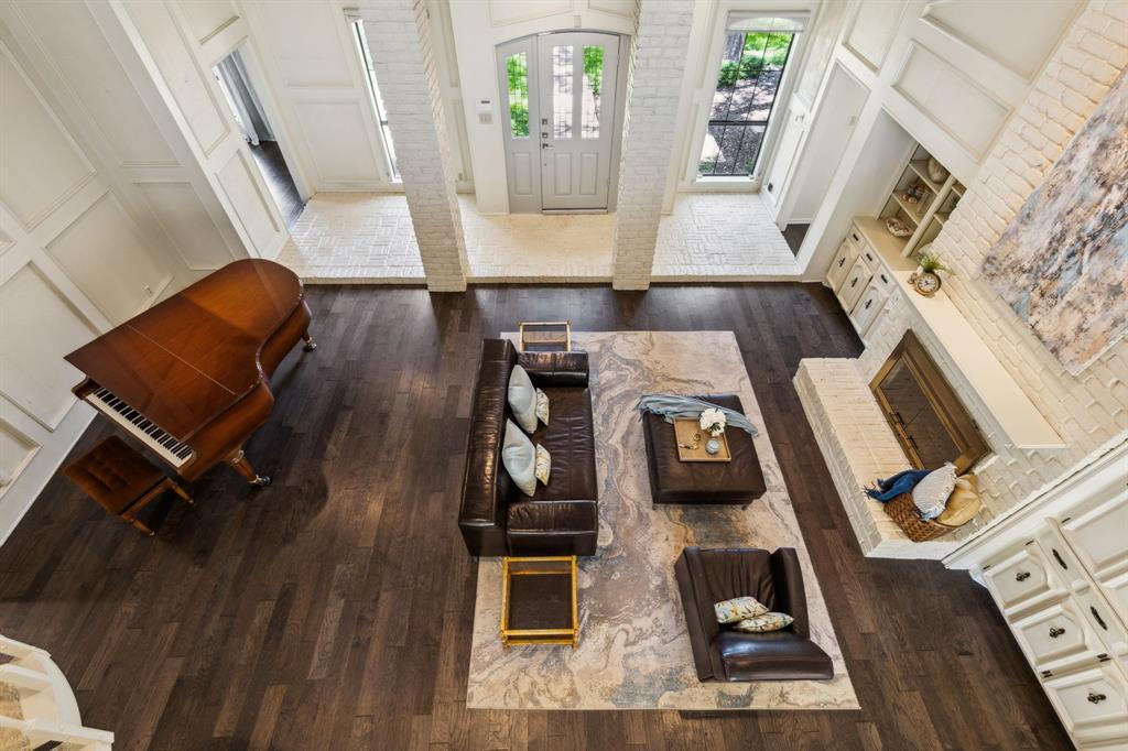 4130 High Star Lane Dallas, TX 75287 - Photo 11 of 38 a living room with furniture and a fireplace