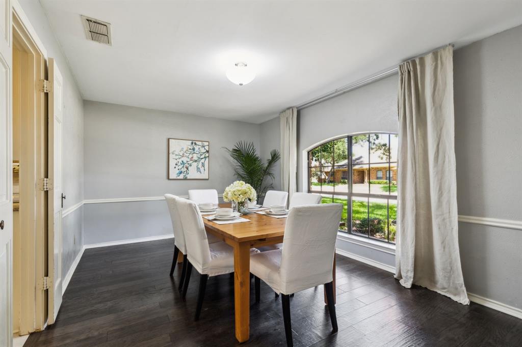 4130 High Star Lane Dallas, TX 75287 - Photo 17 of 38 a view of a dining room with furniture window and wooden floor