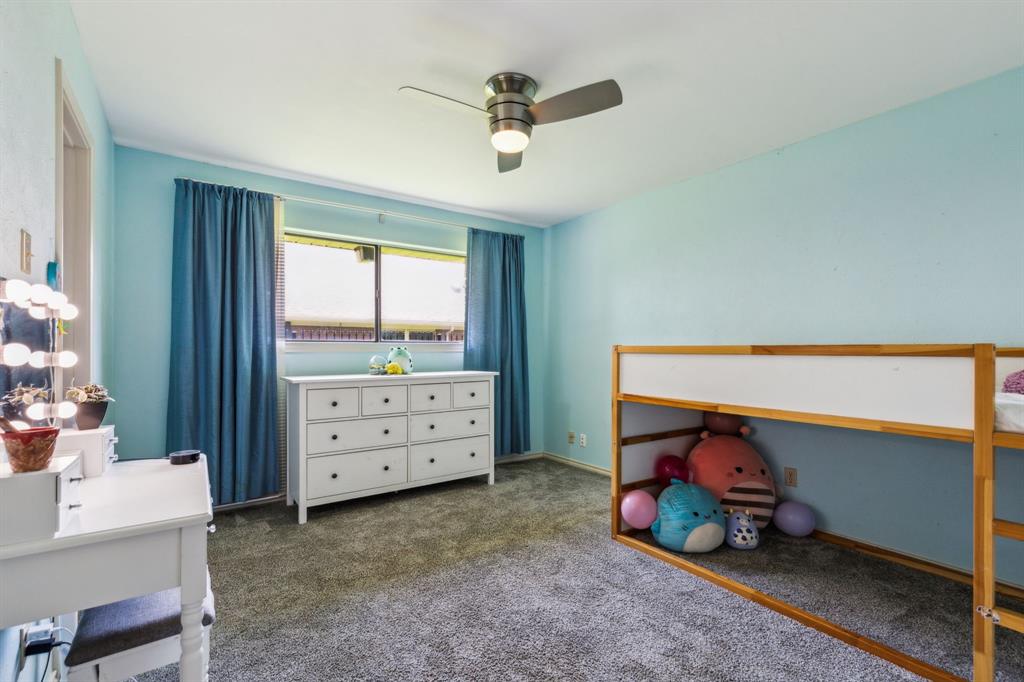 4130 High Star Lane Dallas, TX 75287 - Photo 31 of 38 a bedroom with a bunk bed and a desk