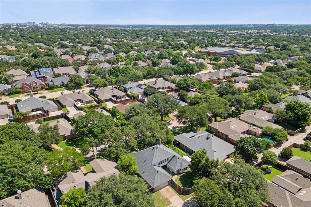 4130 High Star Lane Dallas, TX 75287 - Photo 38 of 38 an aerial view of residential houses with outdoor space and trees