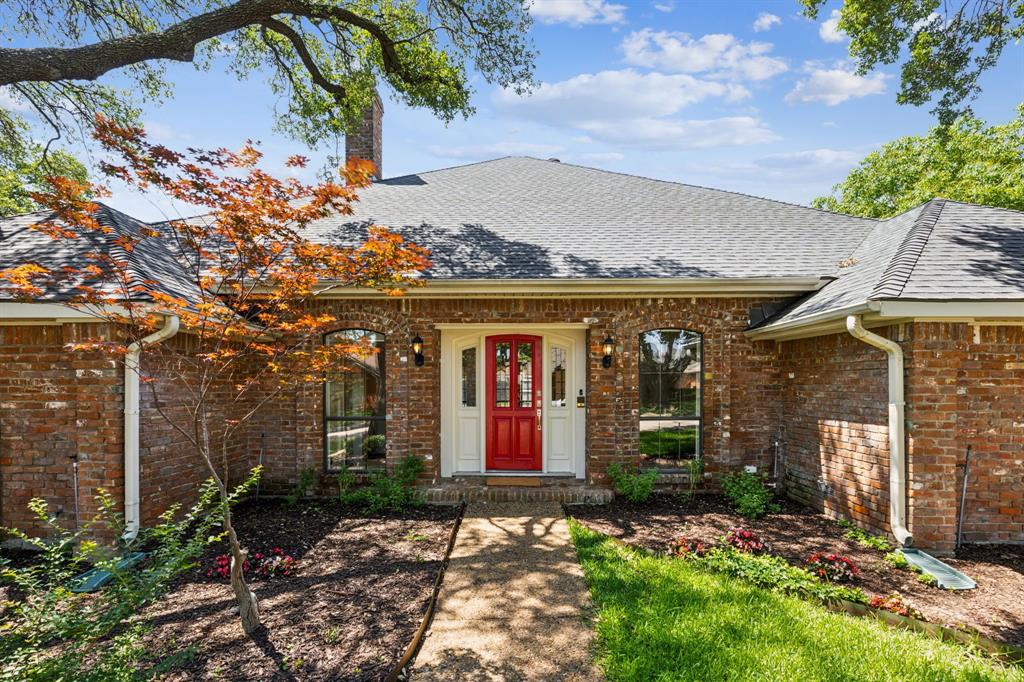 4130 High Star Lane Dallas, TX 75287 - Photo 6 of 38 front view of a house with a small yard