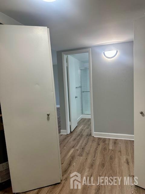 356 Ridge Road, Unit J12 Dayton, NJ 08810 - Photo 34 of 42 a view of hallway with wooden floor