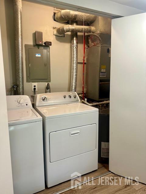 356 Ridge Road, Unit J12 Dayton, NJ 08810 - Photo 40 of 42 a utility room with dryer and washer