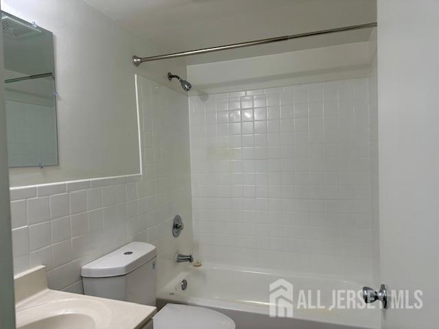 356 Ridge Road, Unit J12 Dayton, NJ 08810 - Photo 41 of 42 a bathroom with a toilet and shower
