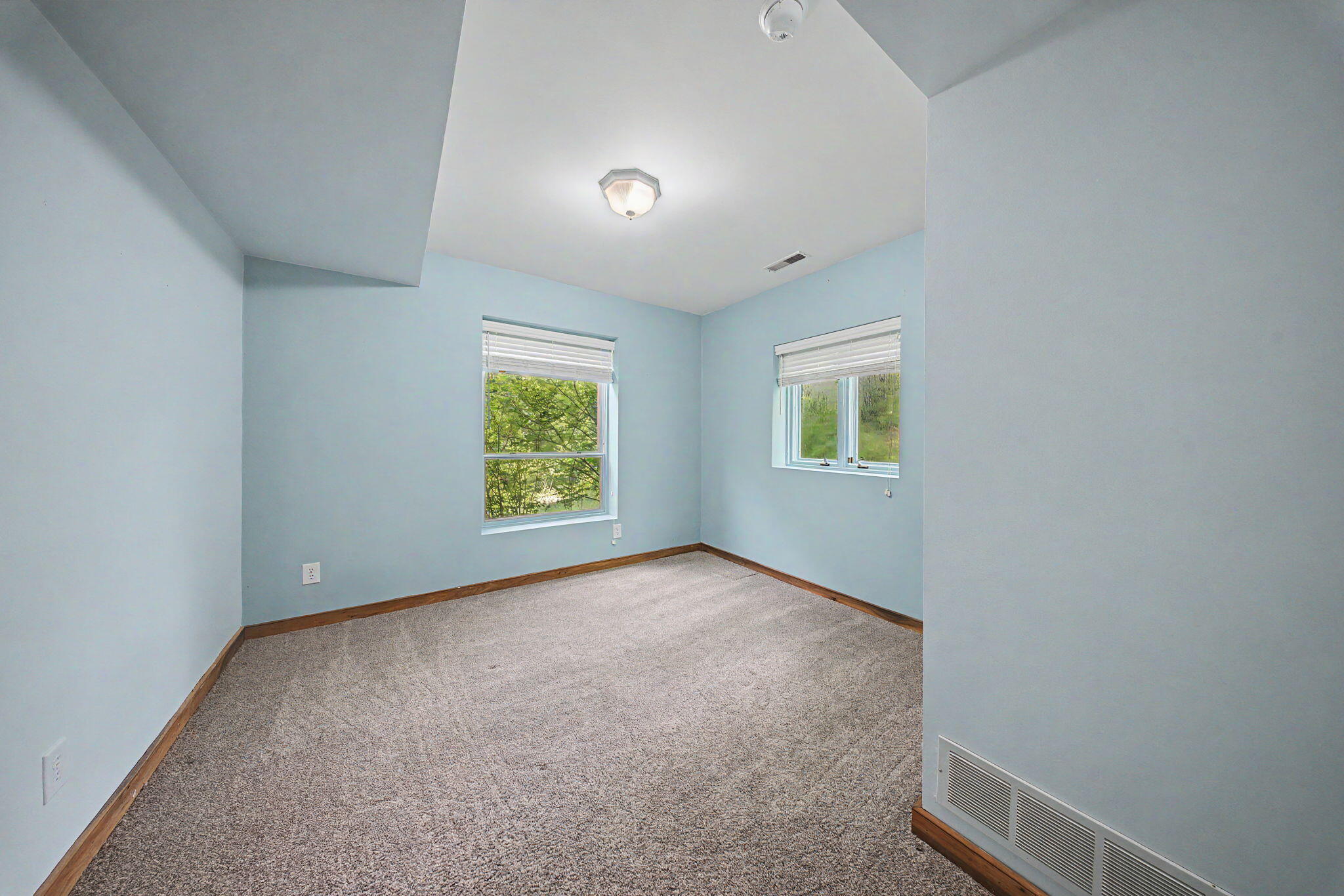 9766 Sullivan Road Union, KY 41091 - Photo 35 of 50 One of two bedrooms located in the basement with big windows and large closets.