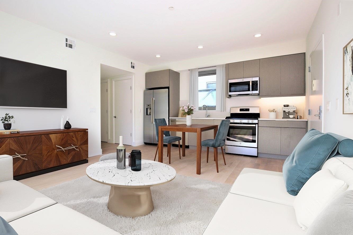 110 Court Street, Unit 2 Hoboken, NJ 07030 - Photo 1 of 14 a living room with furniture and a flat screen tv