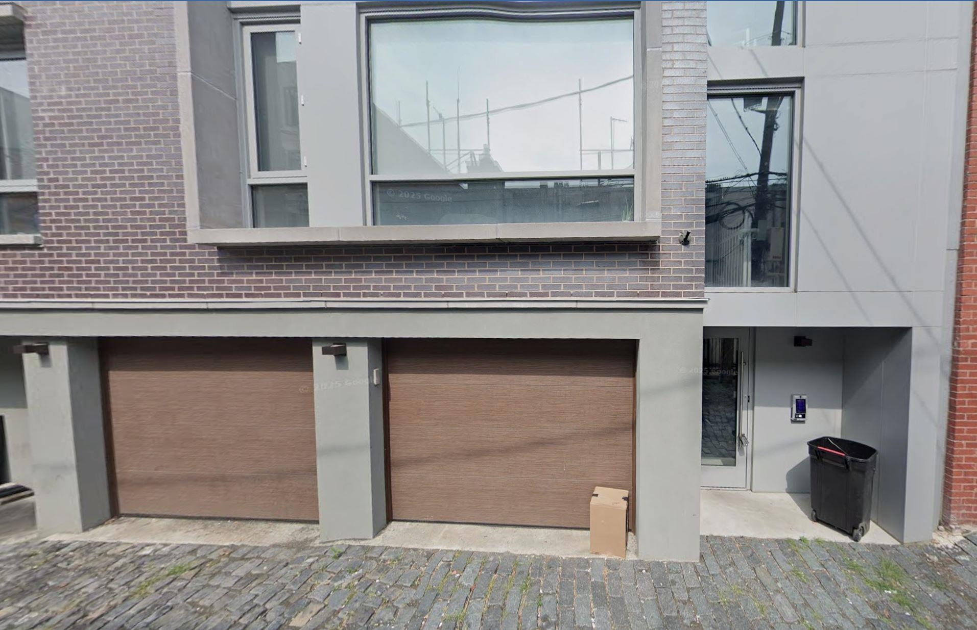 110 Court Street, Unit 2 Hoboken, NJ 07030 - Photo 14 of 14 a front view of a house with a garage