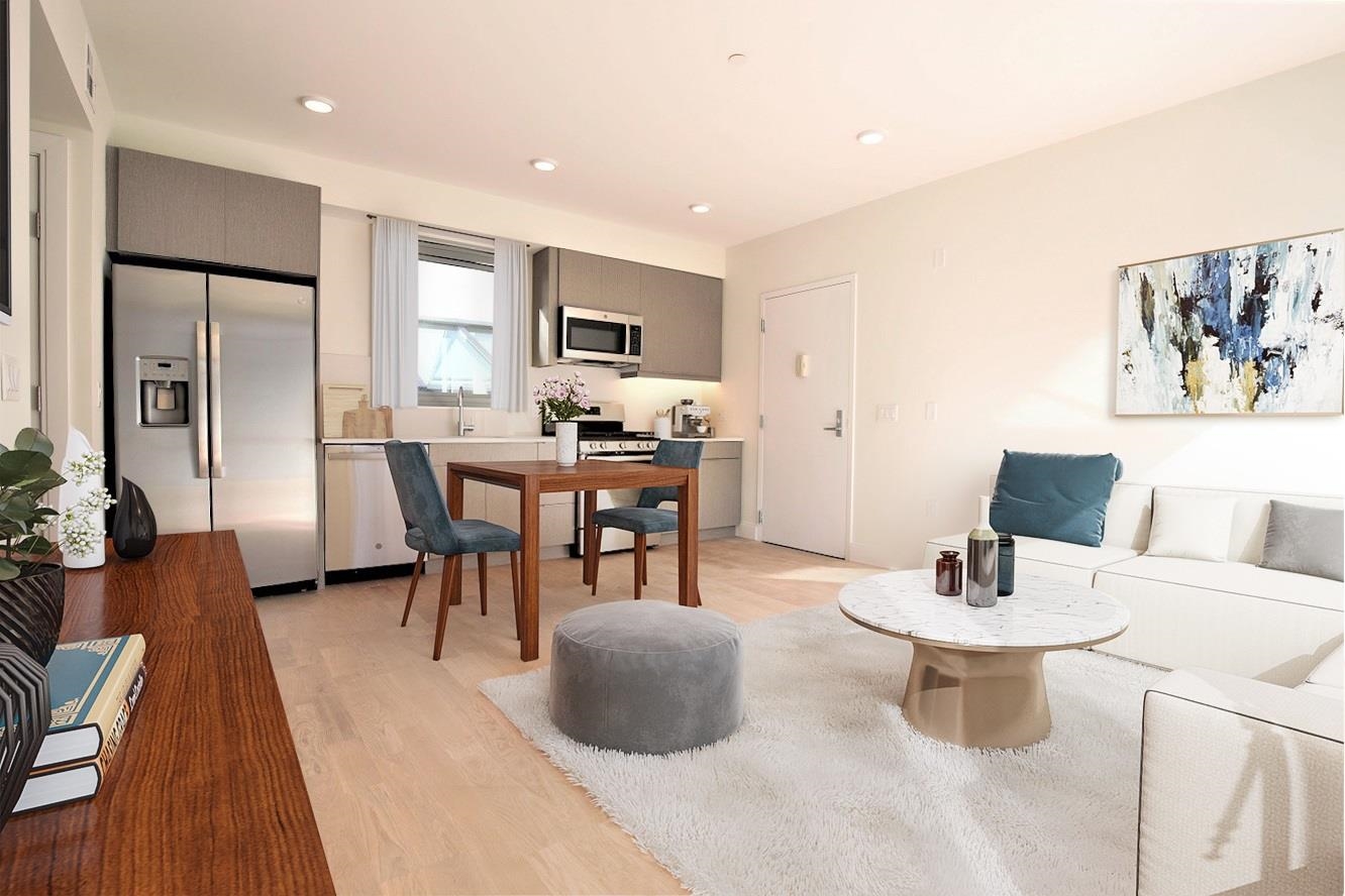 110 Court Street, Unit 2 Hoboken, NJ 07030 - Photo 4 of 14 a dining room with furniture and window