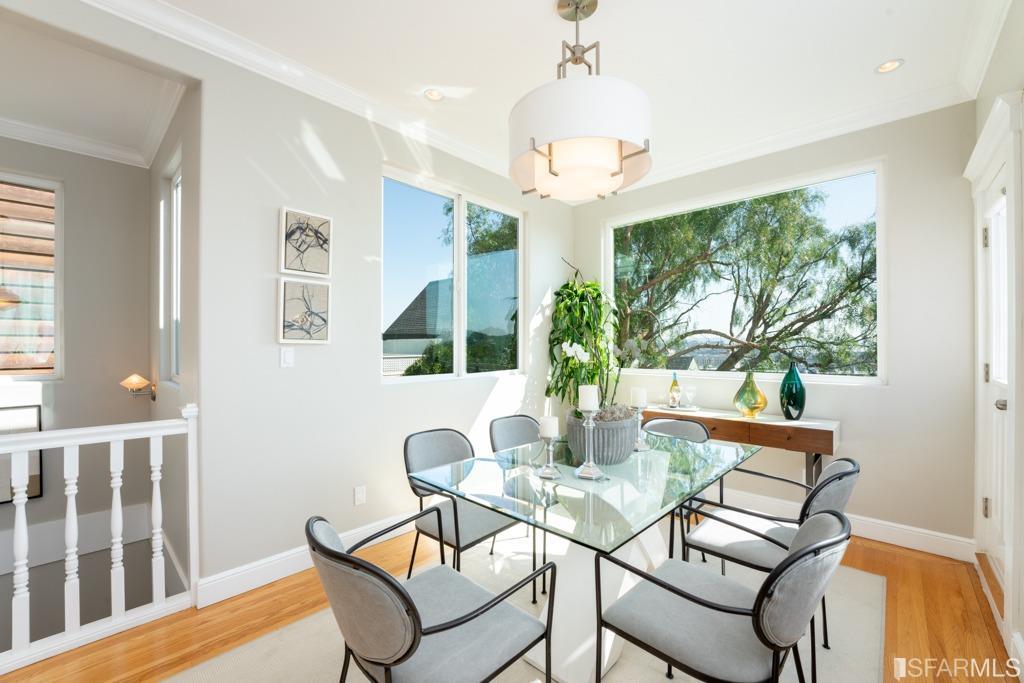 Breakfast nook off of the kitchen, with lovely views of the East Bay and easy access to a side deck.