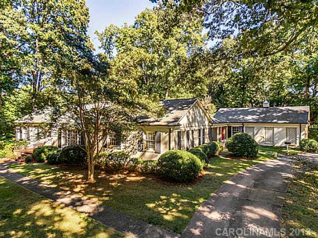 2035 Ferncliff Road Charlotte, NC 28211 - Photo 1 of 16 a view of a big house with a tree in the background