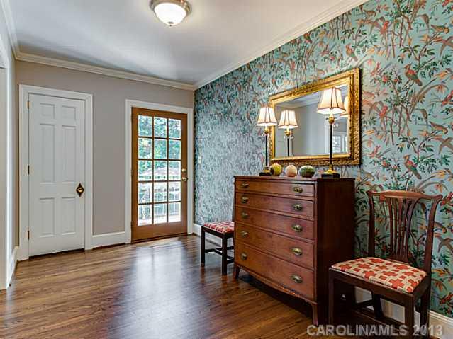 2035 Ferncliff Road Charlotte, NC 28211 - Photo 2 of 16 a room with a dresser and a window