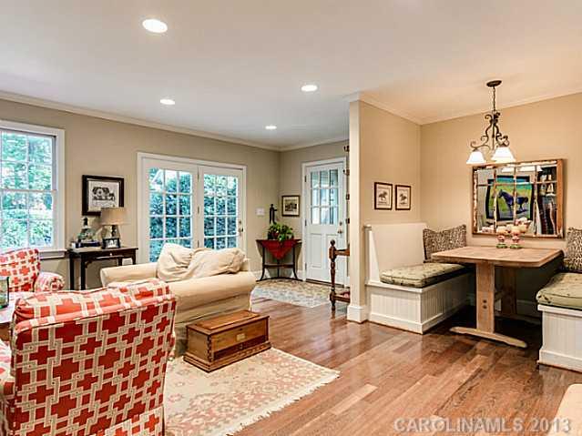 2035 Ferncliff Road Charlotte, NC 28211 - Photo 7 of 16 a living room with furniture a table and large windows