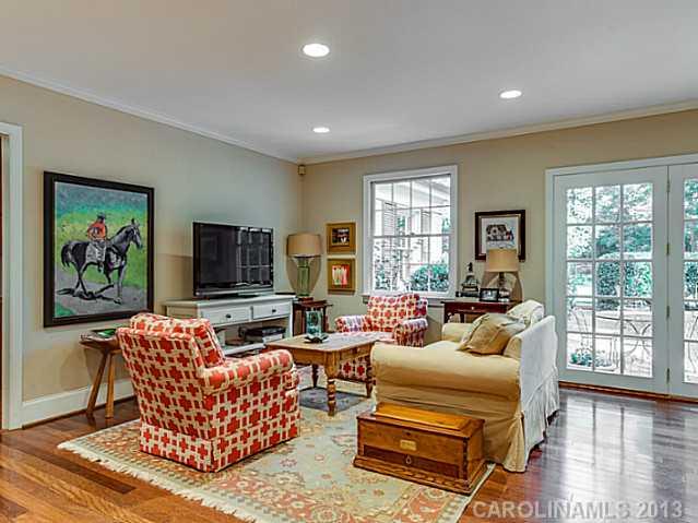 2035 Ferncliff Road Charlotte, NC 28211 - Photo 8 of 16 a living room with furniture a flat screen tv and a window
