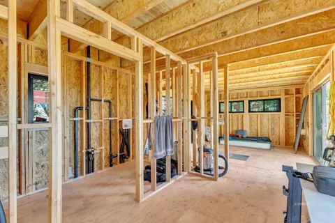 a view of a balcony with wooden walls