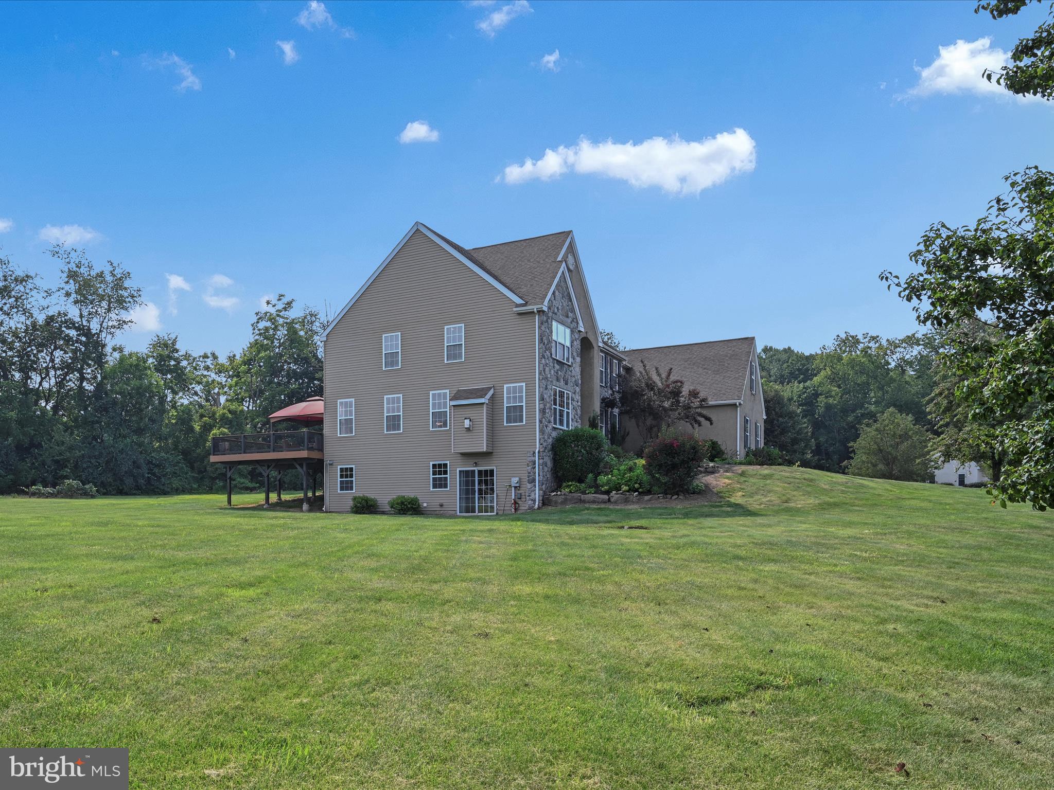 99 Wiand Lane Spring City, PA 19475 - Photo 45 of 48 Side of Home with Basement Sliders and Patio