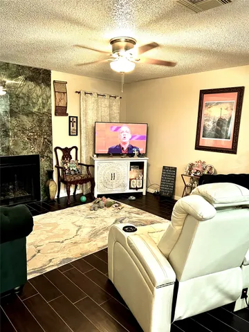 a room with furniture and a fireplace