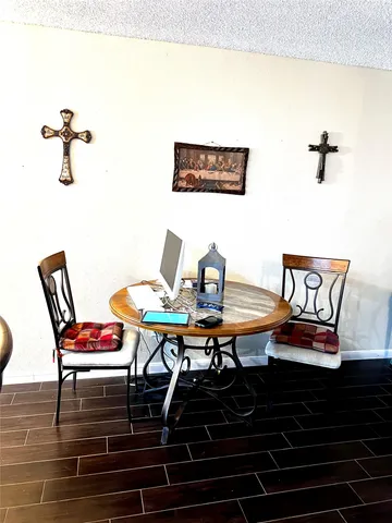 a view of a workspace with furniture