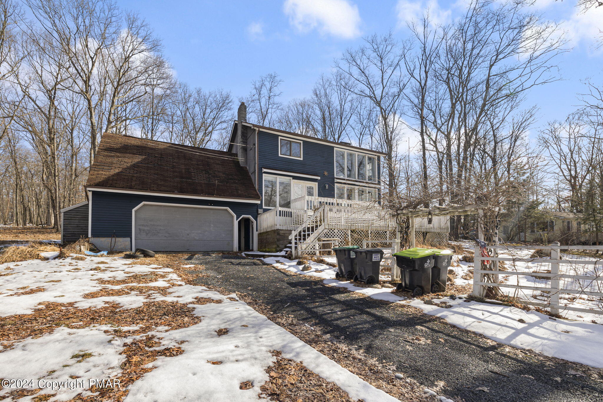 3118 Long Court Bushkill, PA 18324 - Photo 1 of 28 a view of a backyard with table and chairs and a fire pit