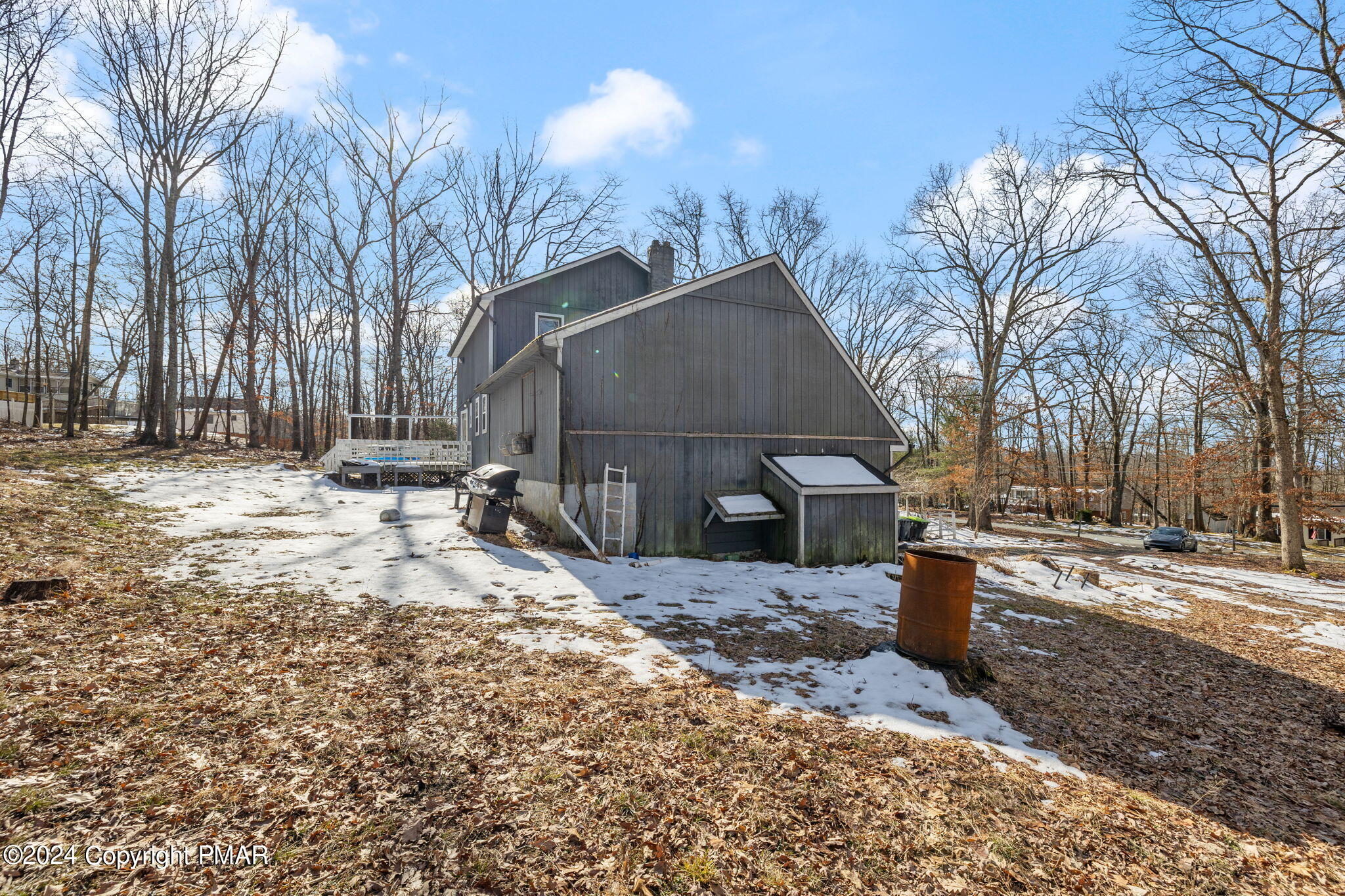 3118 Long Court Bushkill, PA 18324 - Photo 24 of 28 a view of a backyard with snow on the road