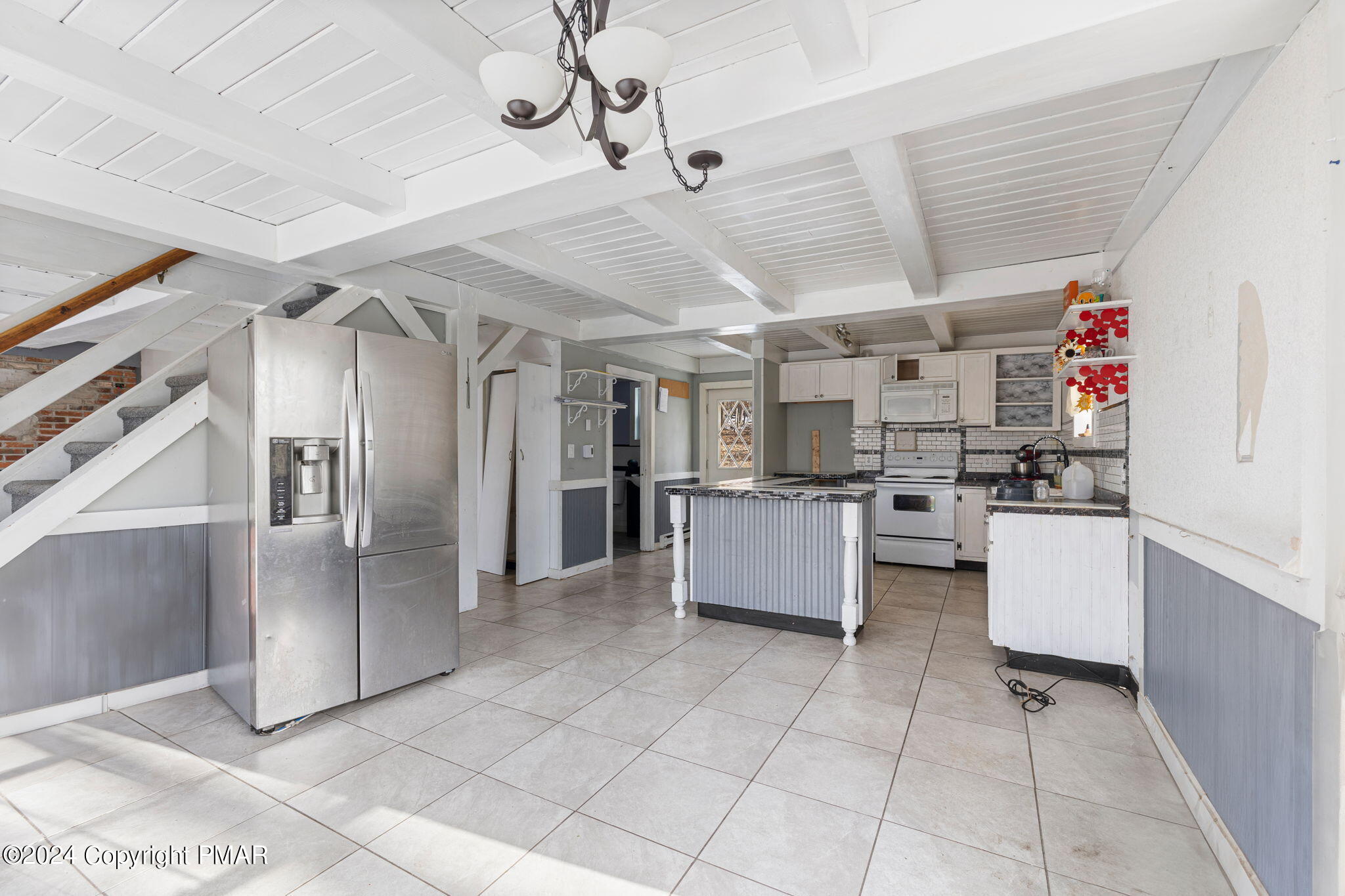 3118 Long Court Bushkill, PA 18324 - Photo 6 of 28 a kitchen with cabinets and refrigerator