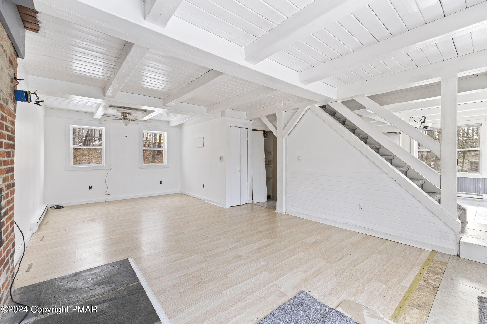 3118 Long Court Bushkill, PA 18324 - Photo 7 of 28 a view of a livingroom with white walls