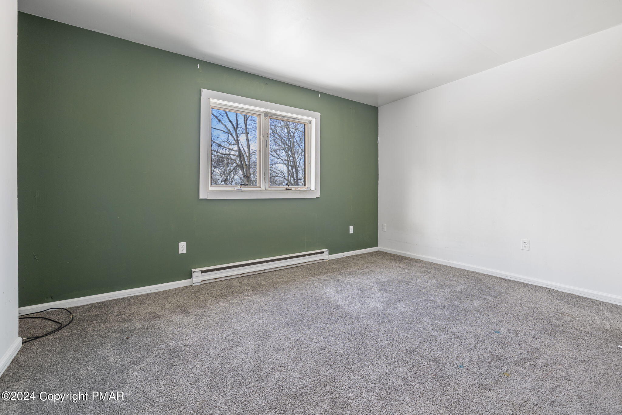 3118 Long Court Bushkill, PA 18324 - Photo 10 of 28 an empty room with wall painting and a window