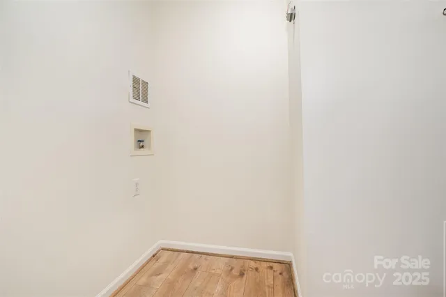 a view of room with racks on the wall