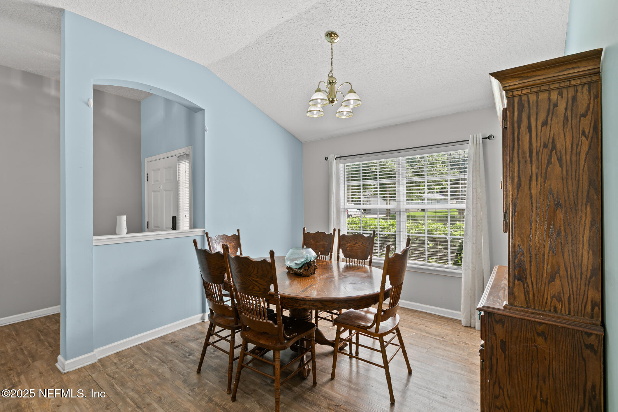 1725 South Summer Ridge Court St. Augustine, FL 32092 - Photo 11 of 46 a view of a dining room with furniture window and outside view
