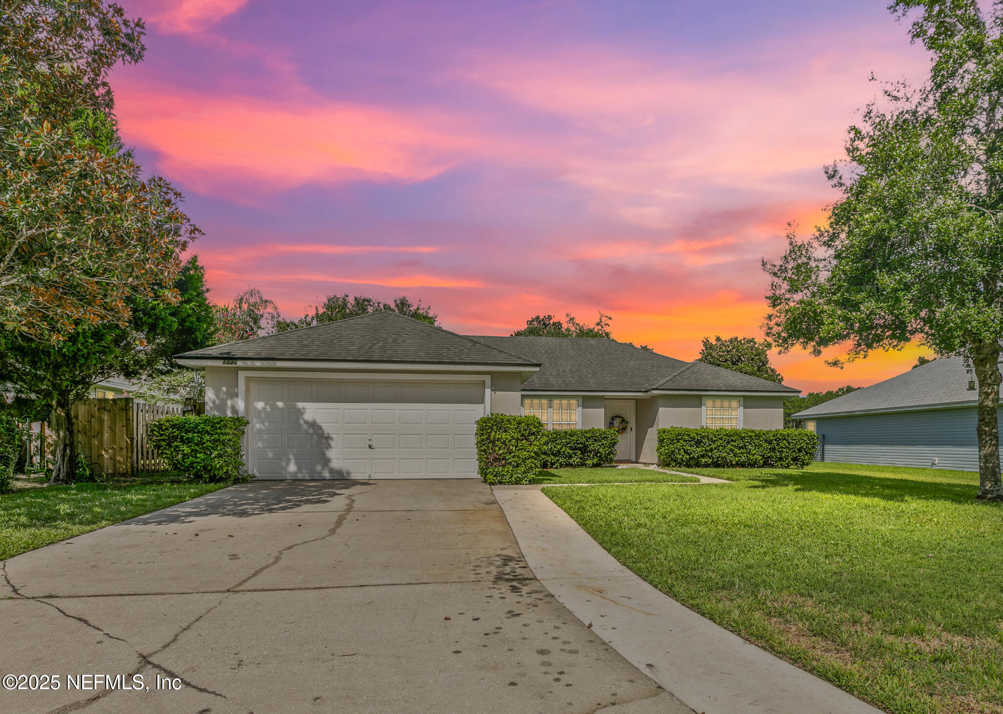 1725 South Summer Ridge Court St. Augustine, FL 32092 - Photo 2 of 46 a front view of a house with a yard