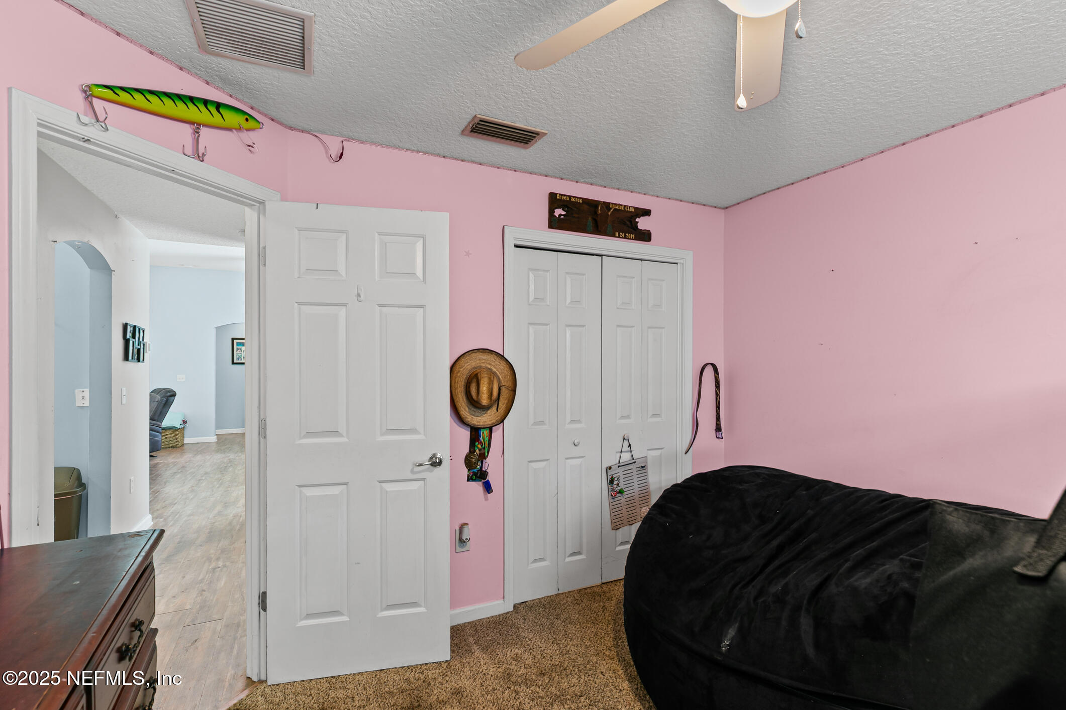 1725 South Summer Ridge Court St. Augustine, FL 32092 - Photo 24 of 46 a bathroom with a sink and a mirror